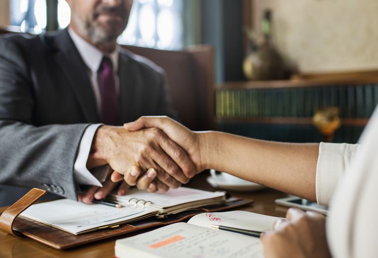 Attorney meeting with a client
